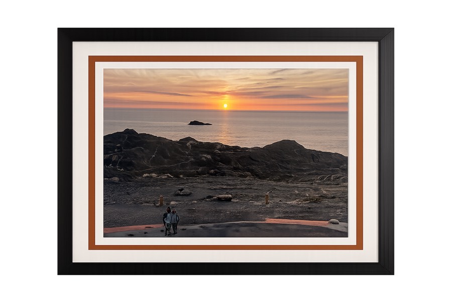 Black frame with double mount around a coastal sunset photograph